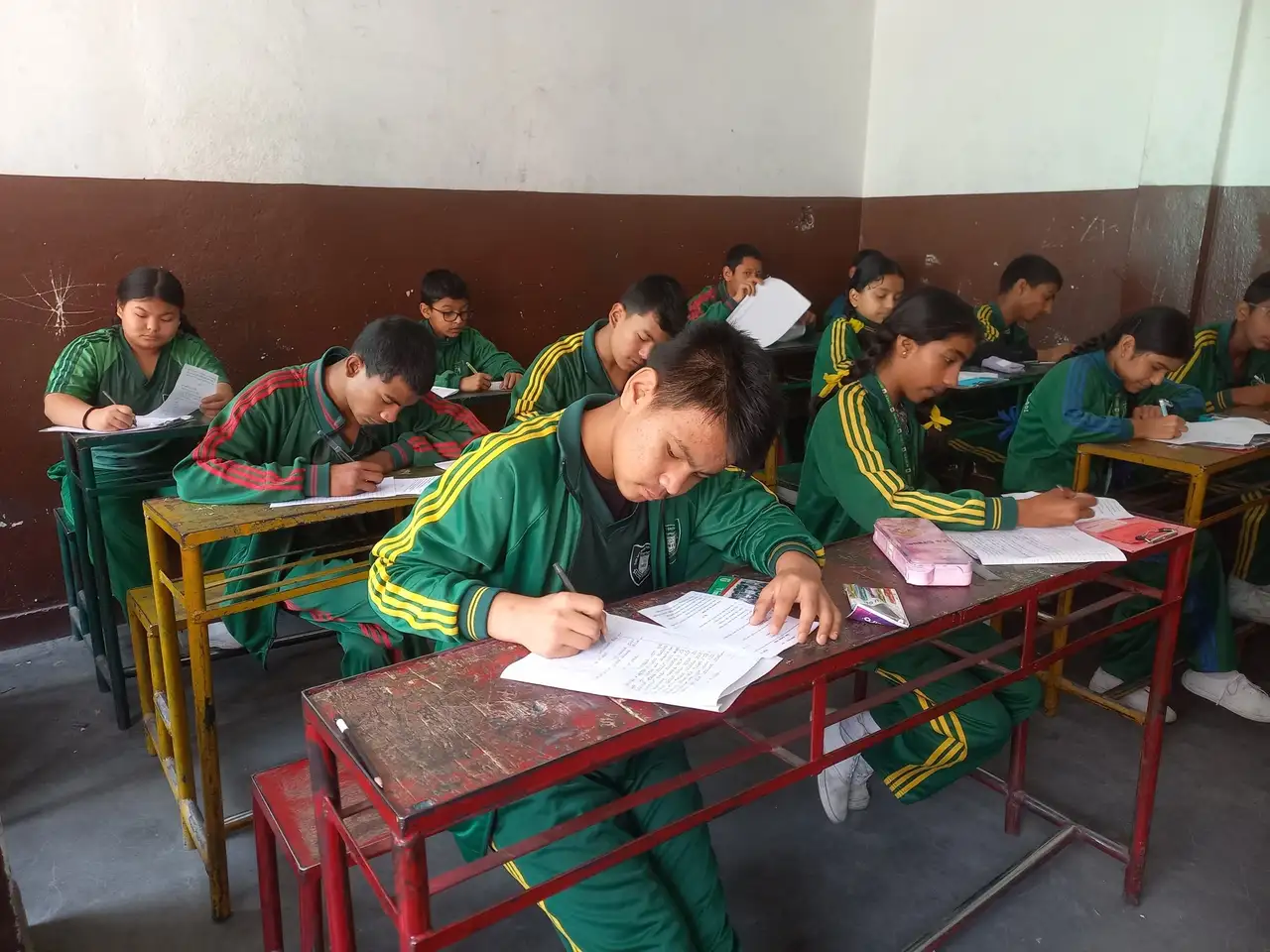 students learning in times school.